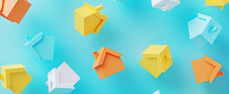 Colorful house objects on blue background. Horizontal composition.